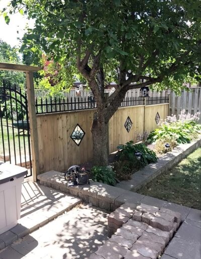 Ferrari Fences Matching Metal Gate And Wood Fence With Security Spikes