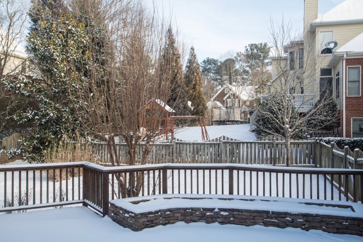 Snow in Back Yards and on fences and decks - spring fence damage Ontario